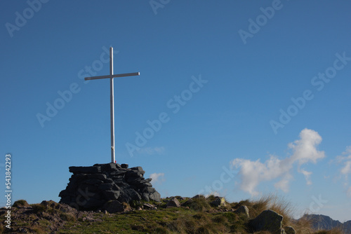 Cross at the top of the mount Cima Papa Giovanni Paolo II - Orobie Alps - Italy photo