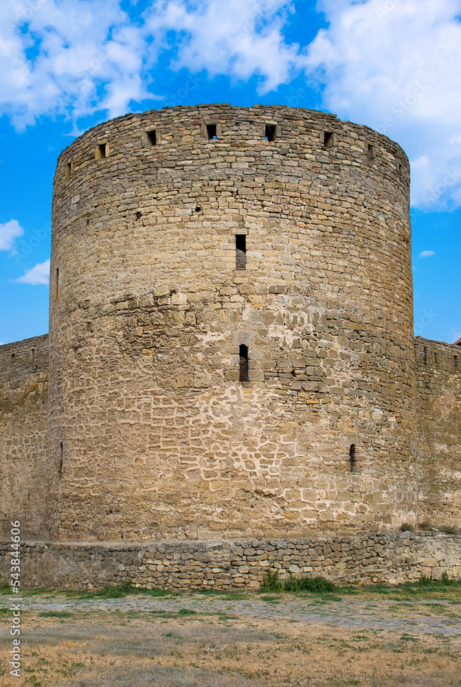 Tower of a medieval fortress (Belgorod Dniester) Ukraine. Vertical photo.