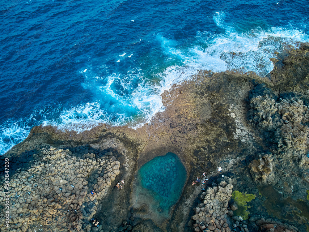 Aerial view of a natural pool in Caleta de Fuste Fuerteventura island drone photography
