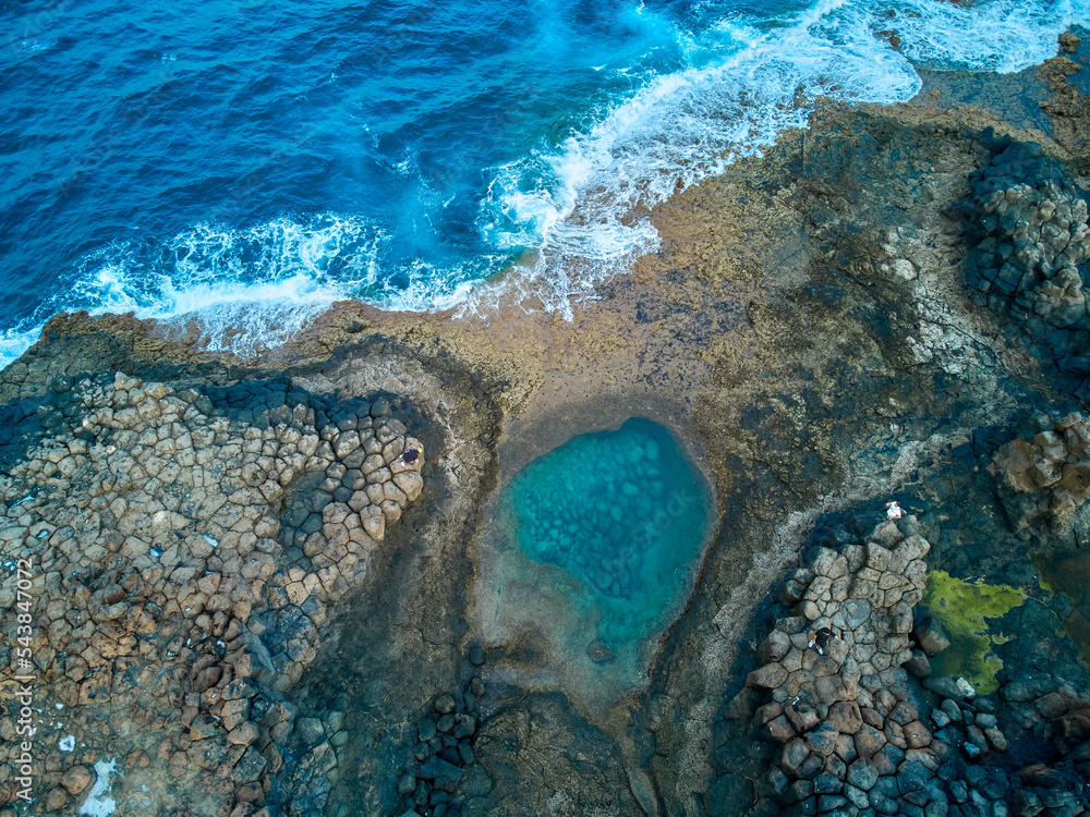 Obraz premium Aerial view of a natural pool in Caleta de Fuste Fuerteventura island drone photography