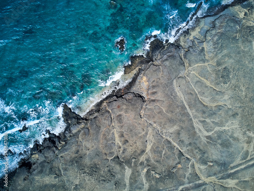 Abstract photo Jandia natural park diagonal line Aerial view of the Atlantic Ocean and the coastline in Eye's beach Tiger tigre ojos Fuerteventura island drone photography