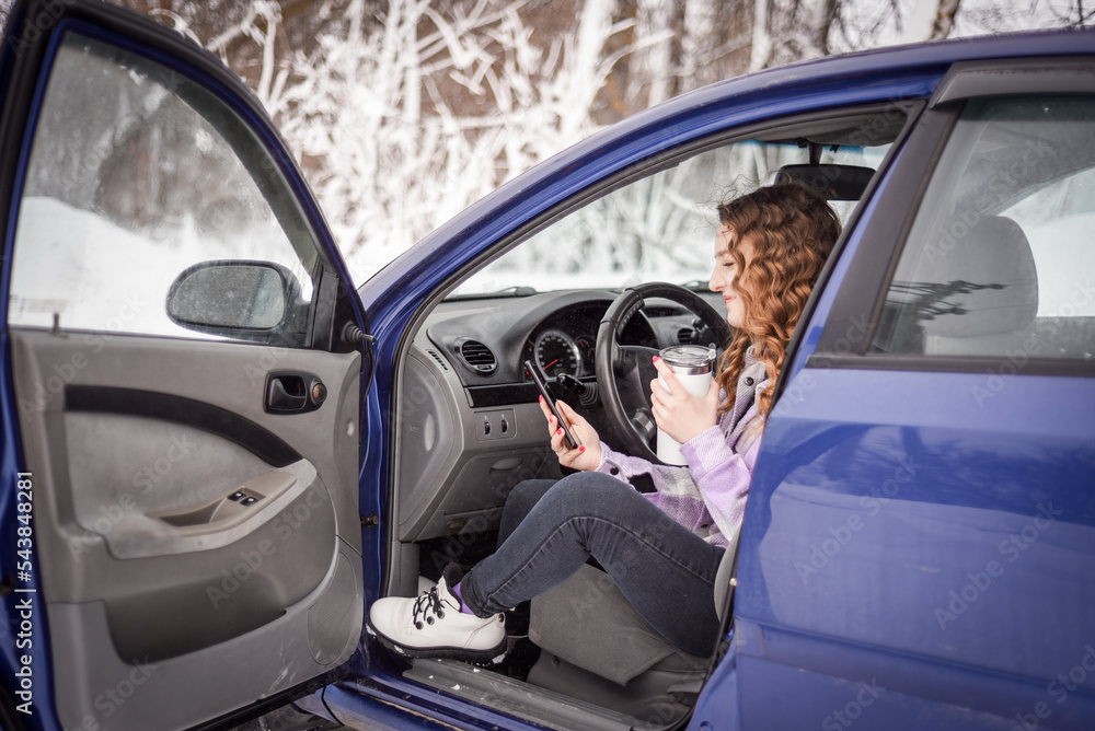 beautiful girl driving a blue car beautiful girl driving a blue car