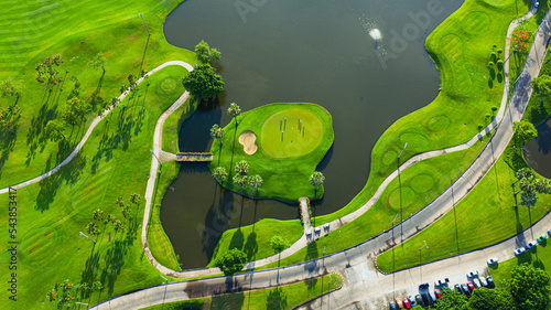 Golf course sport Aerial top view of golf field landscape with sunrise view in the morning shot. Bangkok Thailand 