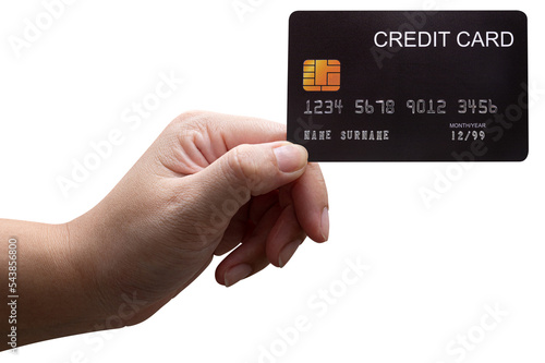 A close-up woman's hand holds a black credit card isolated on white background.