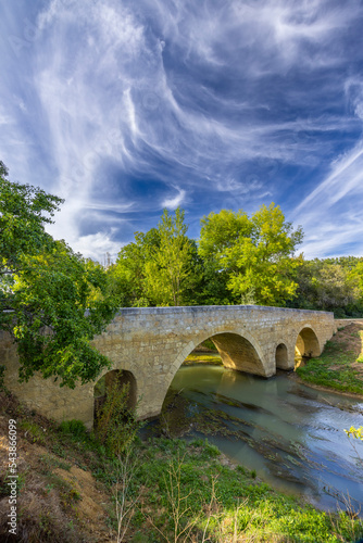 Romanesque bridge of Artigue and river Osse near Larressingle on route to Santiago de Compostela, UNESCO World Heritage Site, departement Gers, France