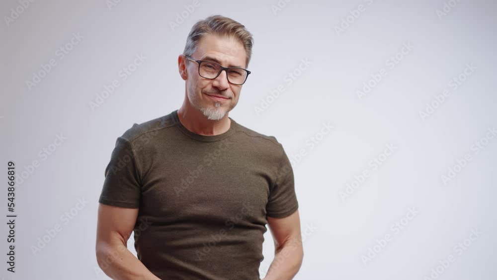 Portrait of happy casual older man smiling, Mid adult, mature age guy with gray hair in glasses, Isolated on white background, copy space. Portrait of happy casual older man smiling, Mid adult, mature age guy with gray hair in glasses, Isolated on white background, copy space.