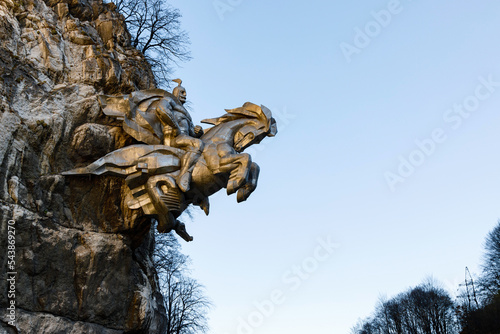 Tseyskoye Gorge, Russia, North Ossetia, October 21, 2021. Sculpture of St. George in the rock at the entrance to the Tseyskoye Gorge. Republic of North Ossetia - Alania photo
