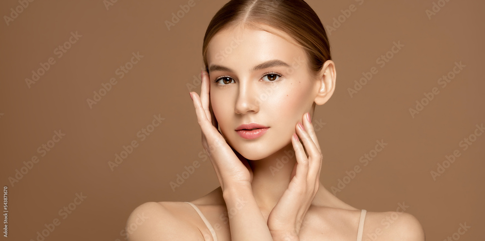 © Kateryna Zghurska - Skincare. Beauty portrait of a young woman with perfect skin posing against beige background. © Kateryna Zghurska - Skincare. Beauty portrait of a young woman with perfect skin posing against beige background.