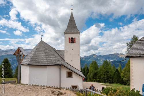 The small Heilig Kreuz church in the Nature Park Fanes Sennes Prags in South Tirol photo