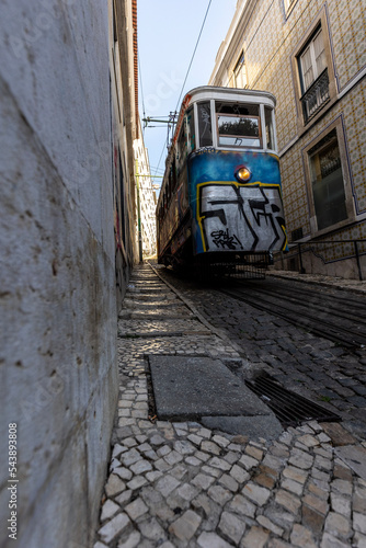 Old hill tram on a side street of Lisbon  photo