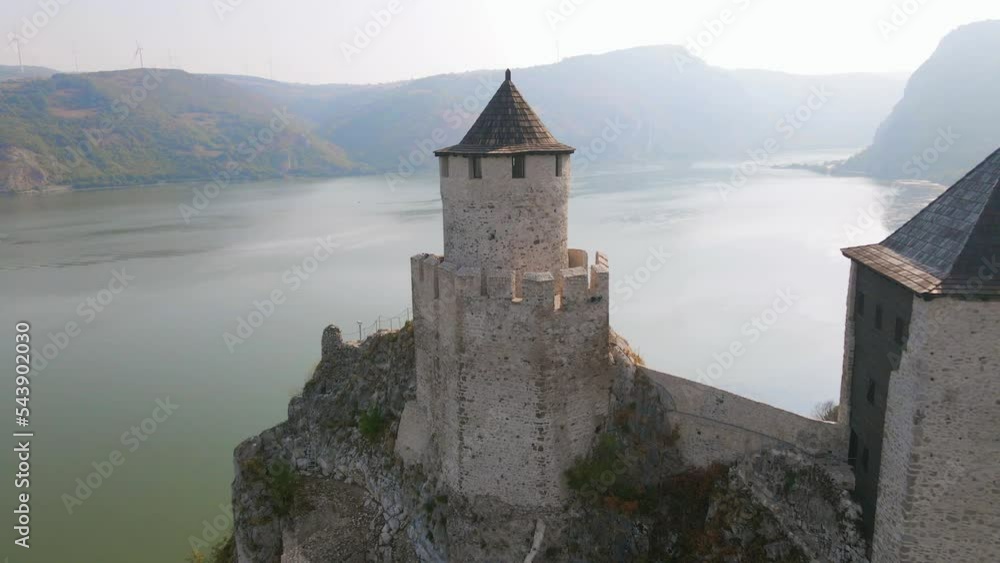 Aerial video of a defensive tower at Golubac fortress on the Serbian bank of Danube river. Footage was taken from a drone during daytime while picking up altitude and flying backwards. Aerial video of a defensive tower at Golubac fortress on the Serbian bank of Danube river. Footage was taken from a drone during daytime while picking up altitude and flying backwards.