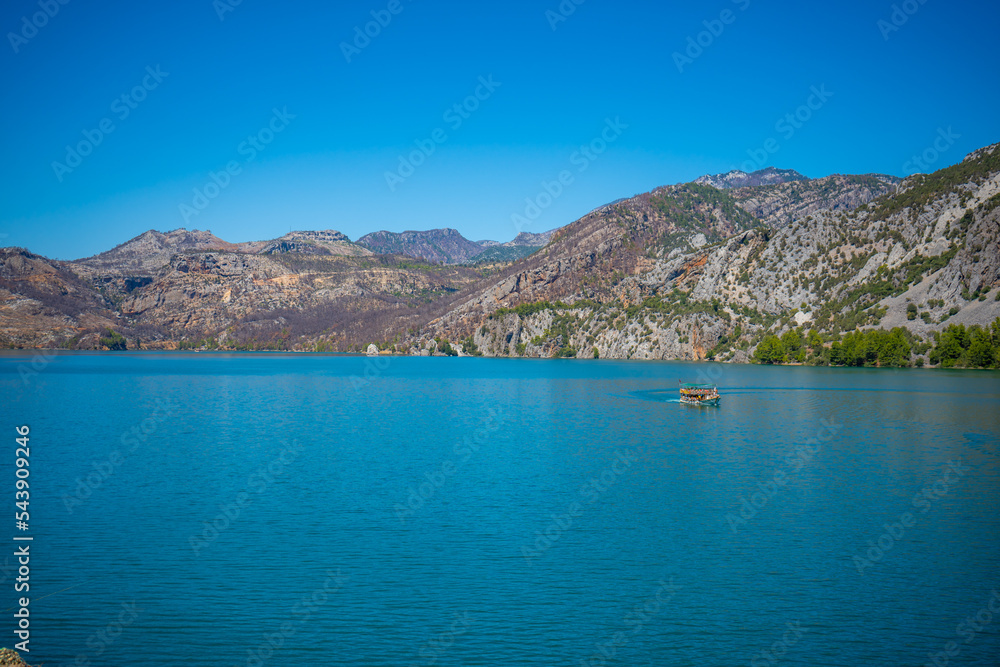 Mountain Lake. Emerald water reservoir behind the dam Oymapinar. Green Canyon in Manavgat region, Turkey.