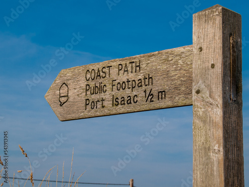 Signpost on the cornish coast path between Port Gaverne and Port Isaac in north Cornwall photo