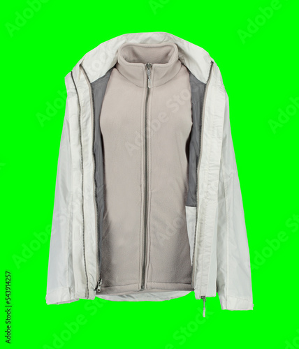 Open white warm jacket. Insulated white women's jacket on a green background. Isolated image on a green background. Nobody.  photo