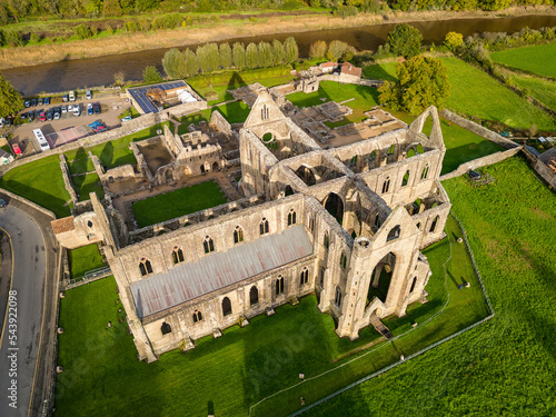 Aerial view of an ancient ruined cistercian monastery (Tintern Abbey, Wales. Built circa 12th century AD) photo