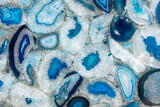 Sample of blue mosaic made of pieces of natural agate collected in manual handing. Polished semiprecious stone for ceramic wall and floor digital tiles. Exclusive luxury matt gemstone background.