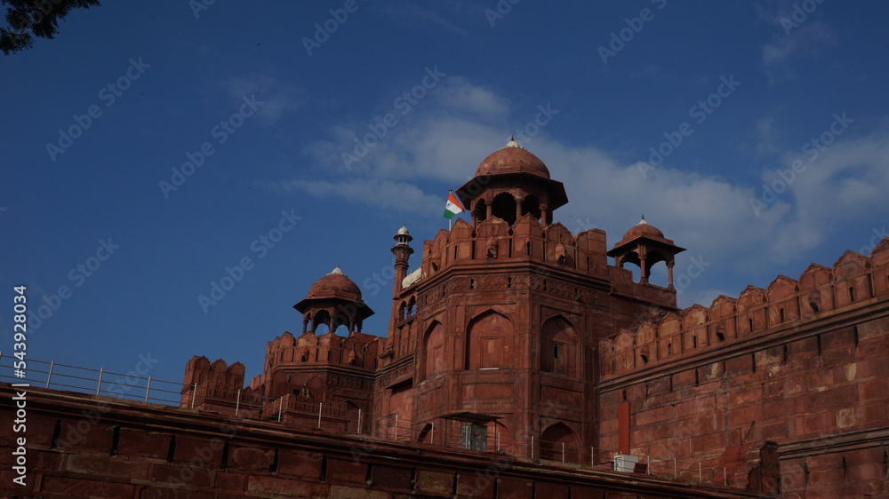 Red Fort with moody skies at sunset Delhi UNESCO World Heritage Site Red Fort in India A heritage site made of red sandstone during the Mughal rule