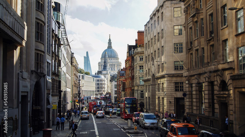 View of St. Paul cathedral from the crowded London street in the morning