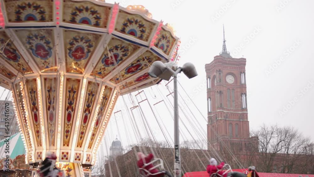 Chain carousel, amusement park, people ride. An enthusiastic smiling ...