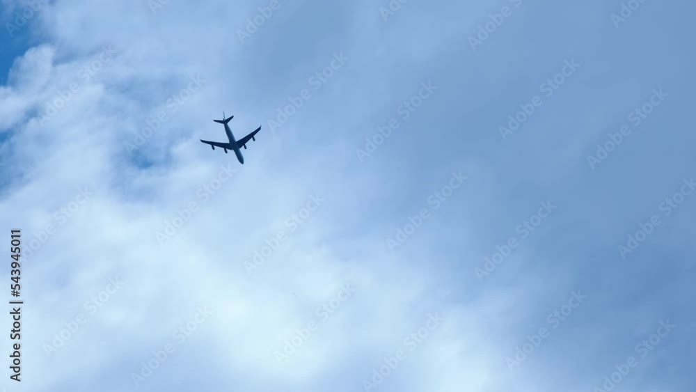Jet flying in skyward. A view of modern jet flying in the blue clear sky. A concept of summer tourism to the sea. Jet flying in skyward. A view of modern jet flying in the blue clear sky. A concept of summer tourism to the sea.