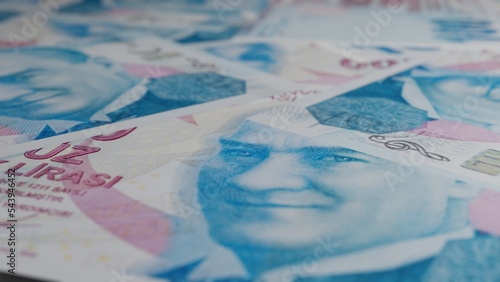 100 Turkish Lira banknotes. Paper money. Cash. TRY. Financial and business concept.	 photo