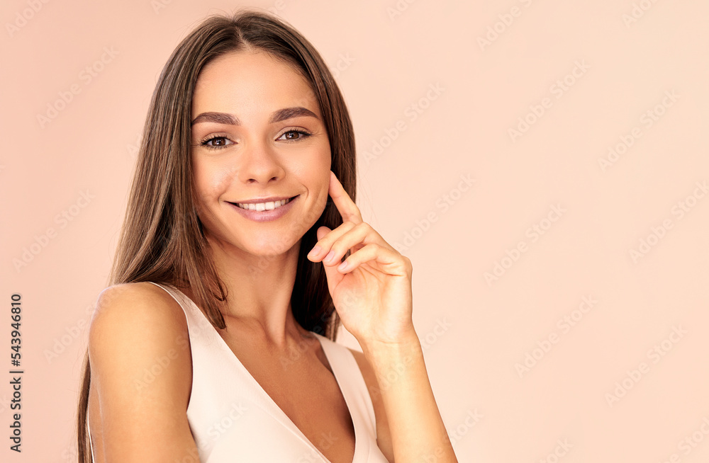 Attractive woman close up on a pink background. Beauty concept. Attractive woman close up on a pink background. Beauty concept.