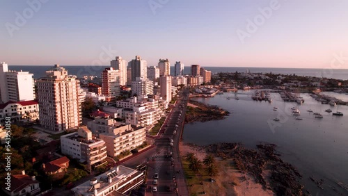 Aerial view on coastal city in Punta Del Este, Uruguay on sunset. High quality 4k drone footage