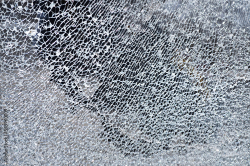 Broken glass texture, full frame. Can be used as an abstract background with copy space.