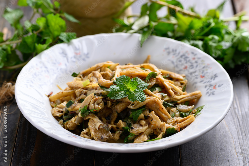 Northern Thai food (Yum Nor Mai), Spicy bamboo shoot salad eating with fresh vegetables, Local Thai food