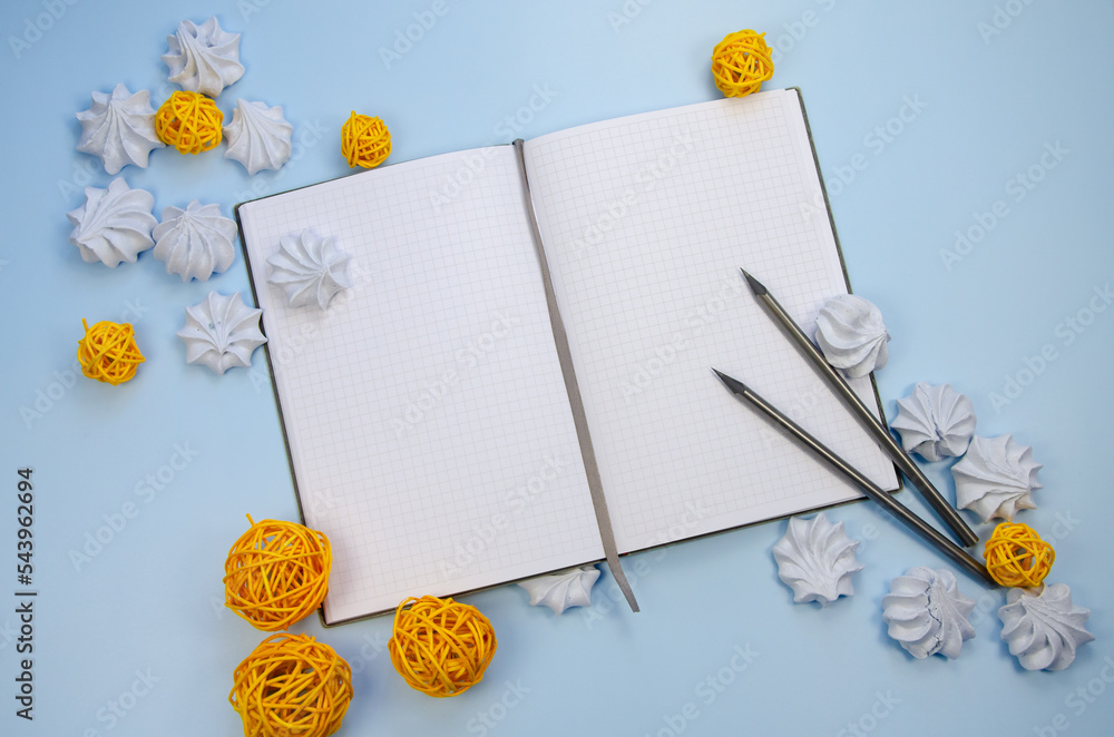 Top view flat lay macarons Opened blank notebook mockup blank pages ...