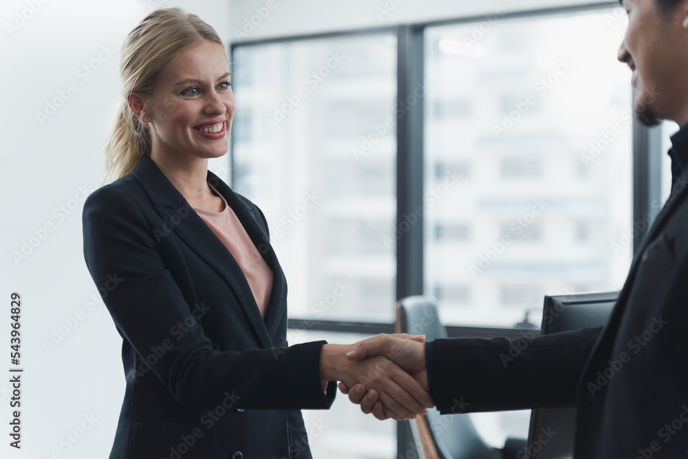 Businessmen and business woman shaking hands during a meeting with reach an agreement for business,Handshake Gesturing People Connection Deal Concept Businessmen and business woman shaking hands during a meeting with reach an agreement for business,Handshake Gesturing People Connection Deal Concept
