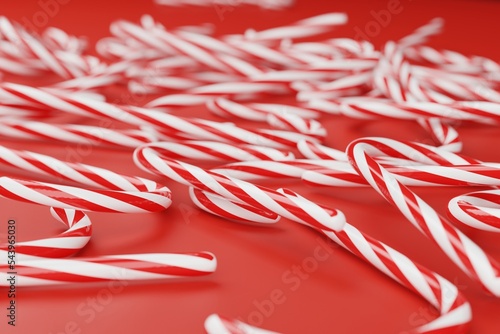 Red and white candy canes on bright red background. 3d rendering