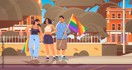 people holding lgbt rainbow flags gay lesbian love parade pride festival transgender love generation Z concept