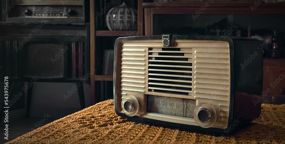 old tube radio on tablecloth vintage stuff background Stock Photo | Adobe  Stock