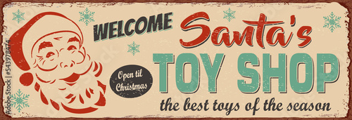 Santa's toy shop metal sign .Retro poster 1950s style.