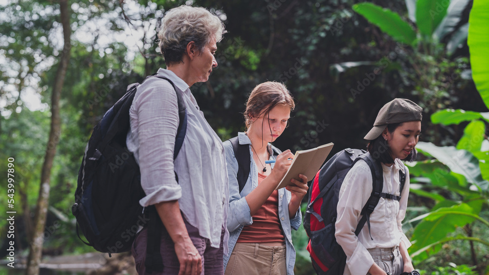 happy women enjoying nature travel.female traveler carrying a backpack.Hiking tourists use maps to travel.woman look at nature in the mountains. happy women enjoying nature travel.female traveler carrying a backpack.Hiking tourists use maps to travel.woman look at nature in the mountains.