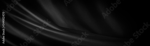 ドレープのある黒い布の背景テクスチャー