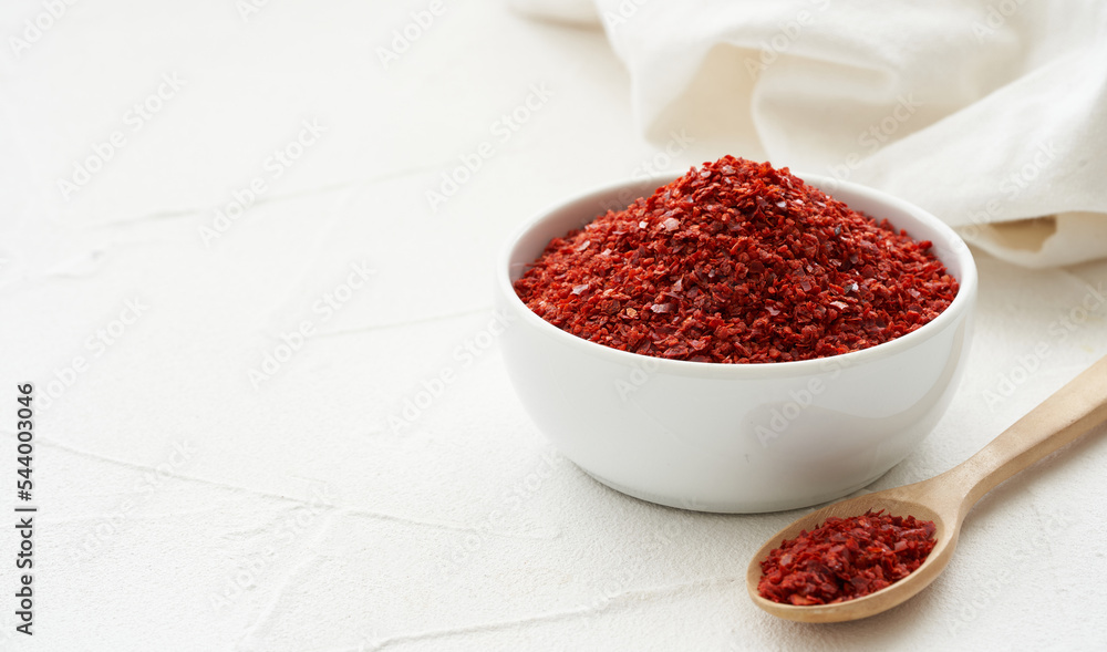 close up a pile of red pepper flake or heap of red pepper powder