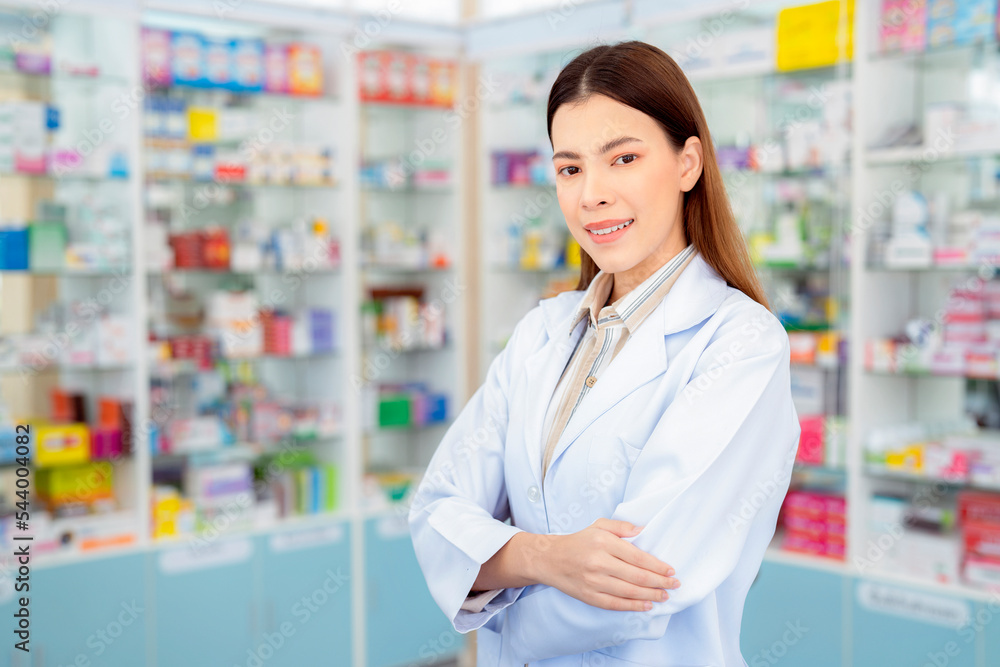 Asian pharmacist woman in pharmacy store