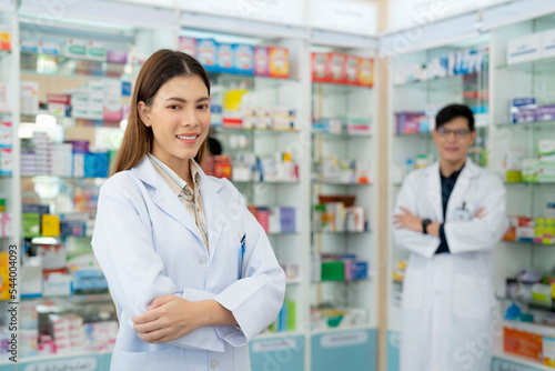 Asian pharmacist woman in pharmacy store