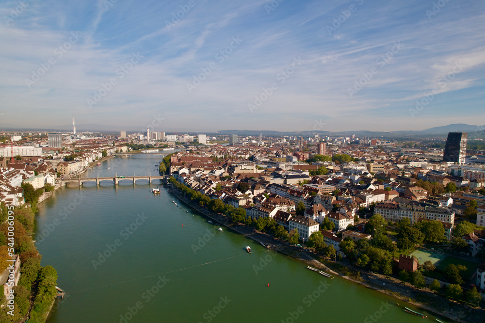 Aerial view of City of Basel with Rhine River and Middle Rhine Bridge on a sunny summer day. Photo taken August 24th, 2022, Basel, Switzerland.