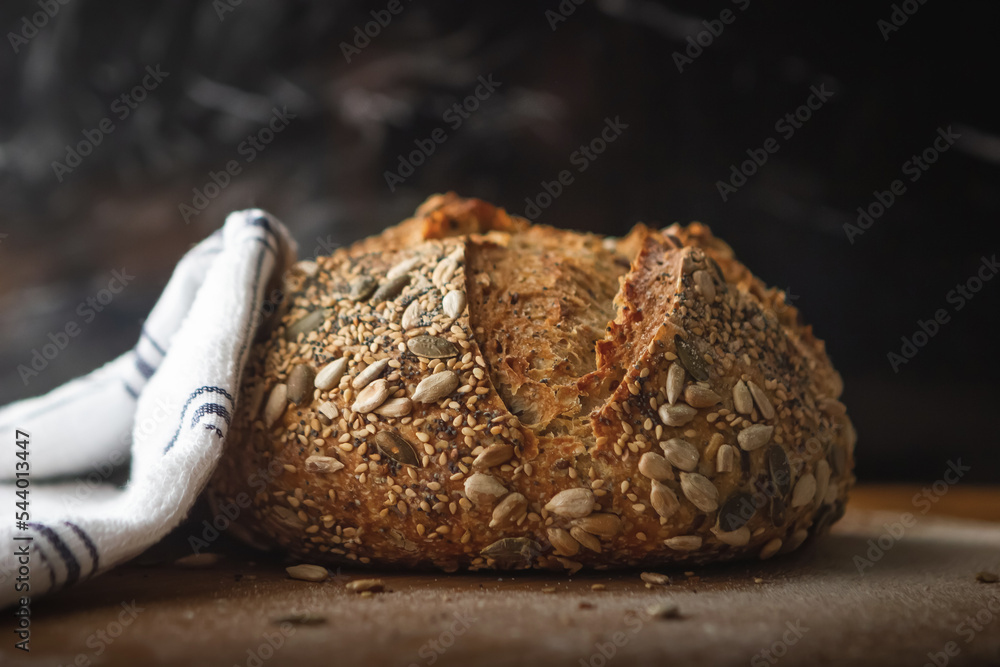 Artisan breads on a wooden table Artisan breads on a wooden table