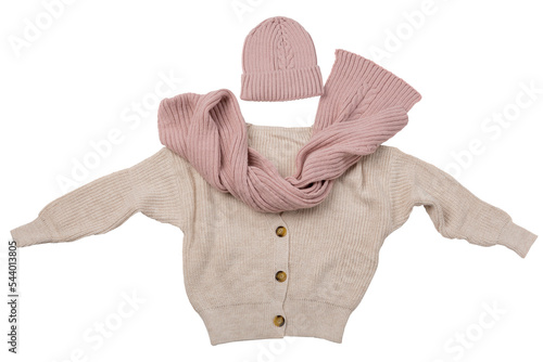 A beige sweater and a pink scarf with a knitted hat are laid out like a person with outstretched arms, isolate