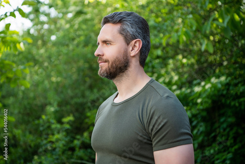 profile view of bearded man in shirt. caucasian man with beard. mature man outdoor