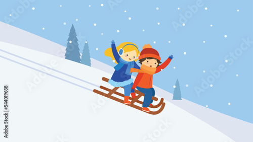 children on a sleigh going down the hill