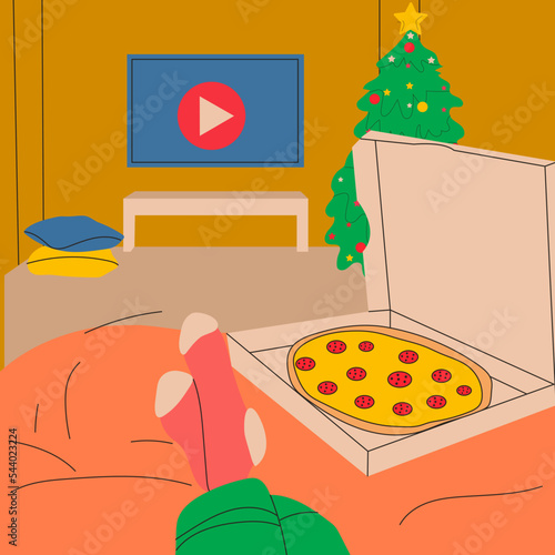 Woman lies on the bed and watches series on TV with pizza in her cute room.