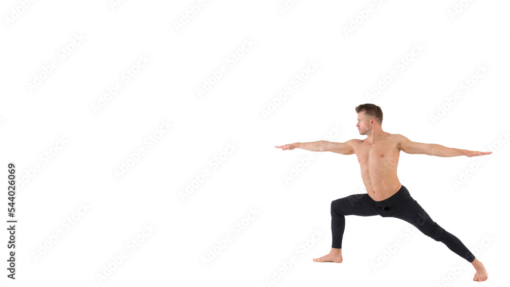 Young attractive man stretches before training.