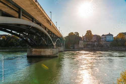 Switzerland, Basel-Stadt, Basel, Sun shining over Wettstein Bridge photo