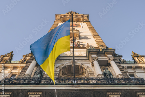 Germany, Hamburg, Ukrainian flag hanging onHamburg City Hall photo