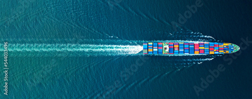 Photographie Cargo container Ship, cargo maritime ship with contrail in the ocean ship carrying container and running for export  concept technology freight shipping sea freight by Express Ship